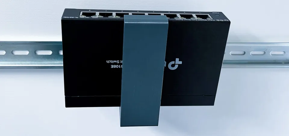 TP-LINK držák na DIN lištu pro rozměr 101x25mm šedá antracit SG108xx/SF1006P/ER6