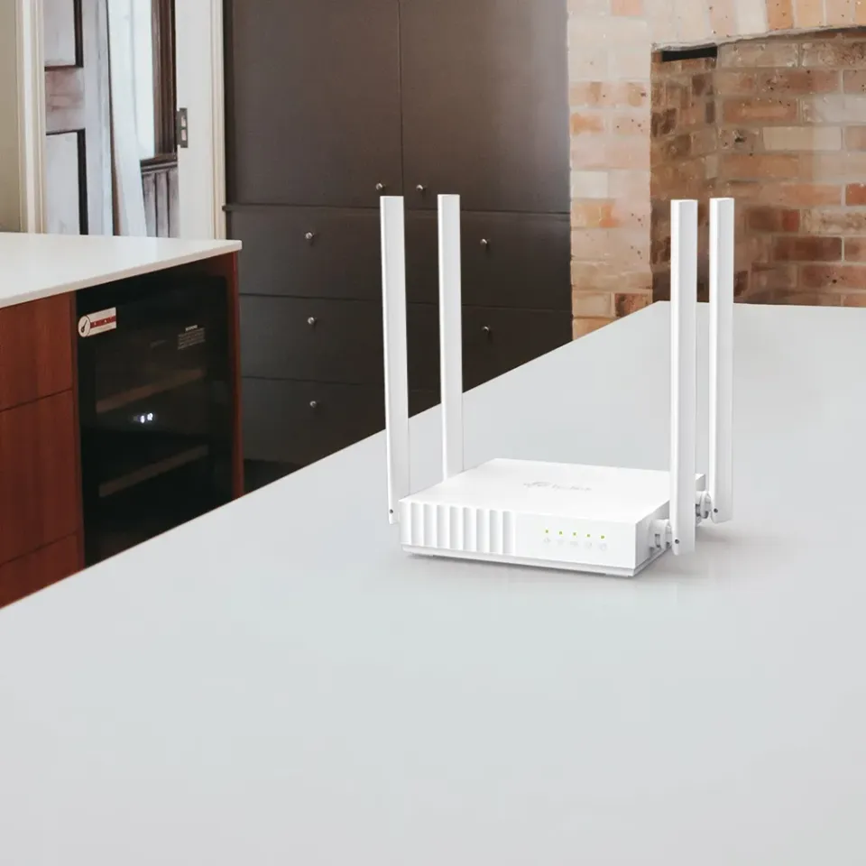 TP-LINK Archer C24 wifi AP/router AC750, 4xLAN, 1xWAN, (2,4GHz, 5GHz, ac) 300 + 433Mbit, 4x fix anténa