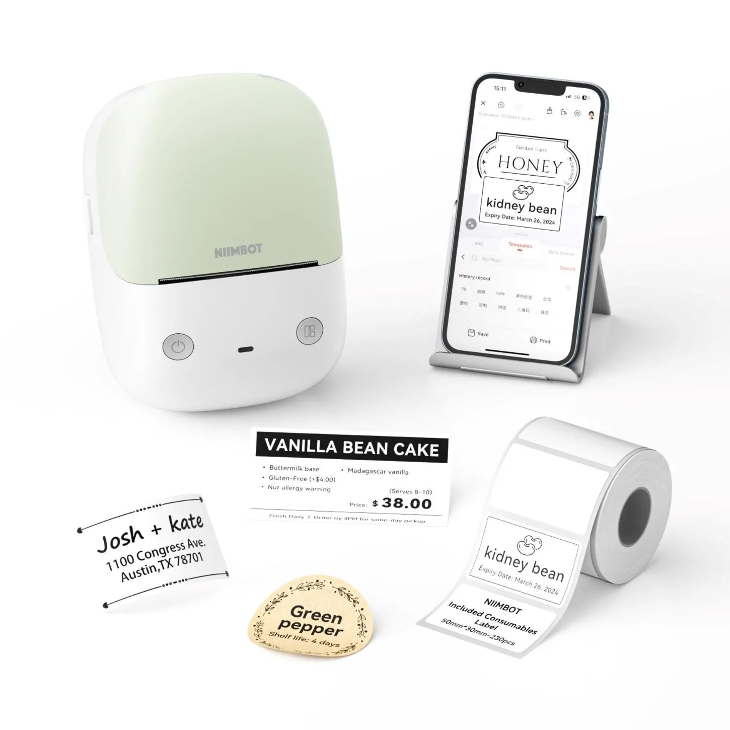NIIMBOT B2 (green) with a phone and samples of printed labels